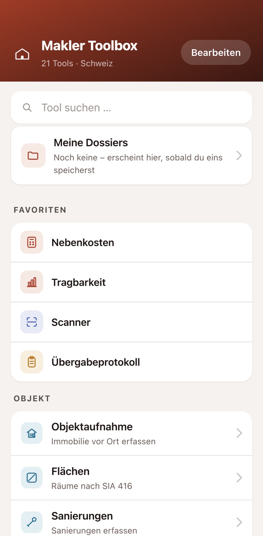 Der Startbildschirm der Makler Toolbox auf dem iPhone – Suche, Favoriten und alle 21 Werkzeuge nach Kategorien